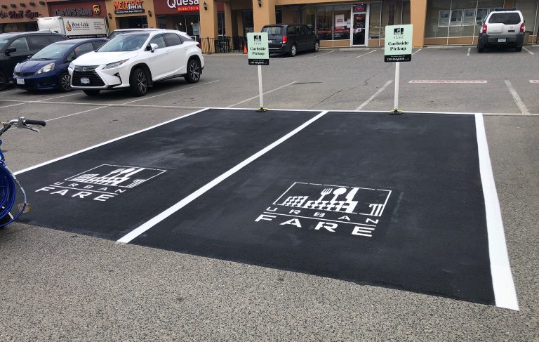 Photo of a newly painted and repaired parking lot