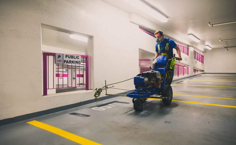 EverLine Coatings Crew applying paint to a parkade